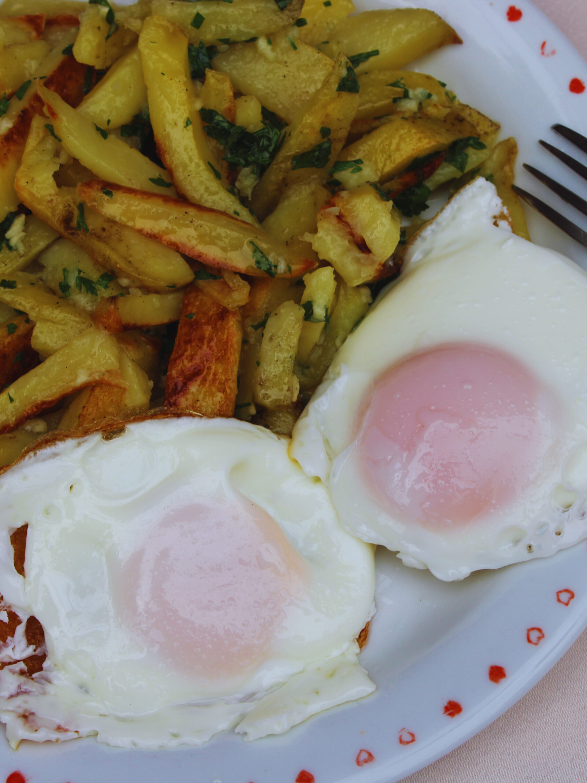 Fried eggs and Garlicky fries.